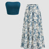 Front view of Teal strapless crop top paired with a white tiered maxi skirt featuring blue floral print and elastic waist set.
