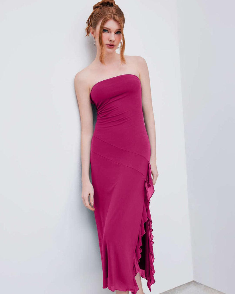 A pink tube gown featuring cascading ruffles and delicate net side detailing for an elegant, statement-making look.