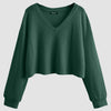 Front view of Trendy cropped sweater with V neckline and relaxed sleeves, perfect for layering or casual winter outfits.