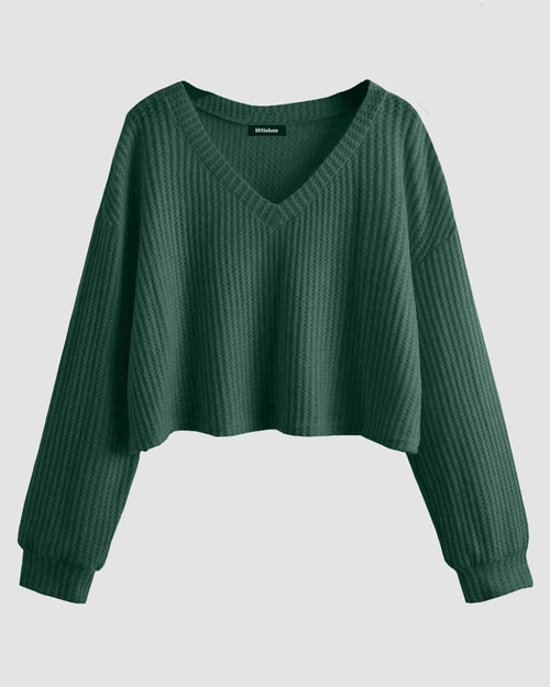 Front view of Trendy cropped sweater with V neckline and relaxed sleeves, perfect for layering or casual winter outfits.