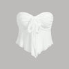 white strapless cropped top featuring a sweetheart neckline, ruched bust with a self-tie knot at the center