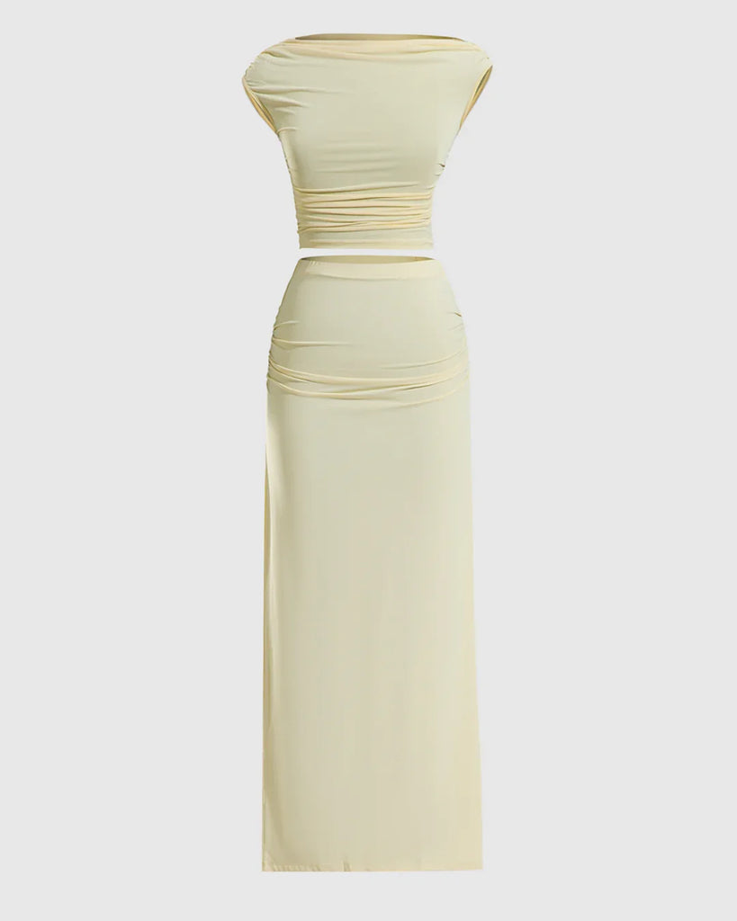 Vanilla ruched sleeveless bodycon maxi dress made of yellow fabric, showcasing a fitted silhouette and elegant design.
