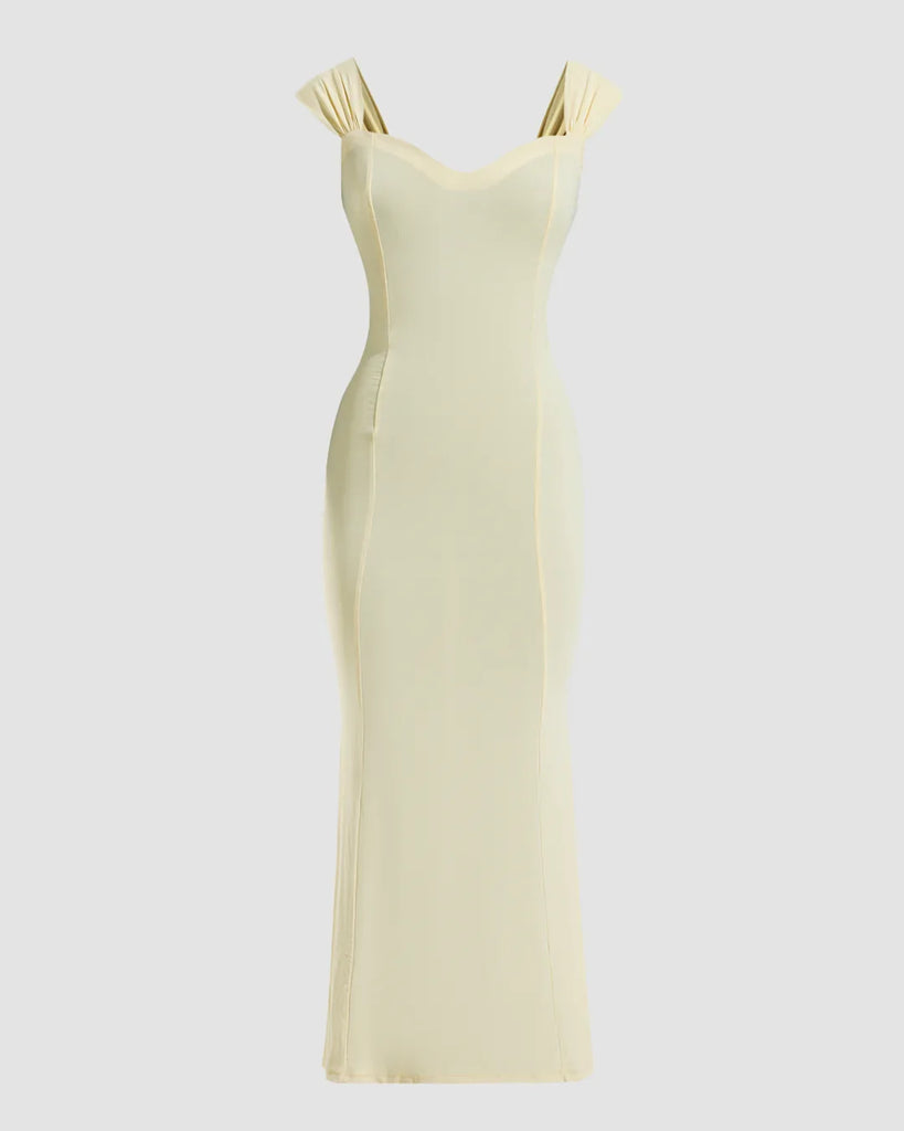 A vanilla sleeveless bodycon maxi dress made from a vibrant yellow fabric, showcasing a fitted silhouette.
