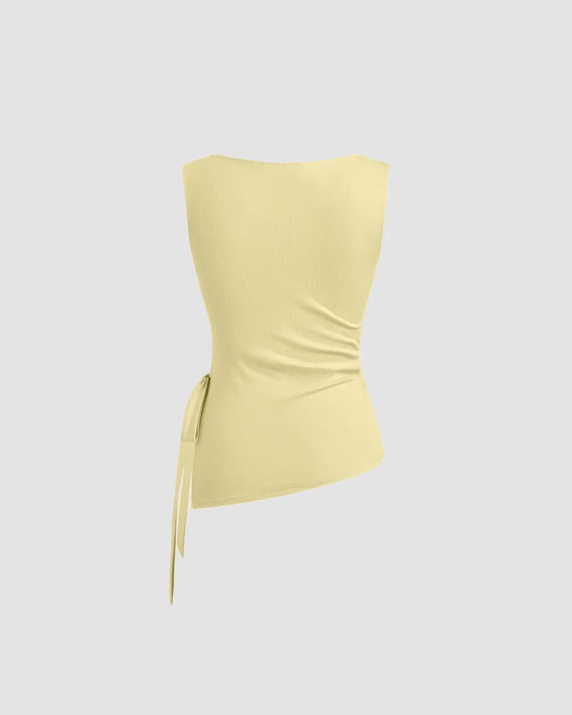 Back side of yellow sleeveless top with a high neck and ruched side detailing, perfect for a stylish summer look