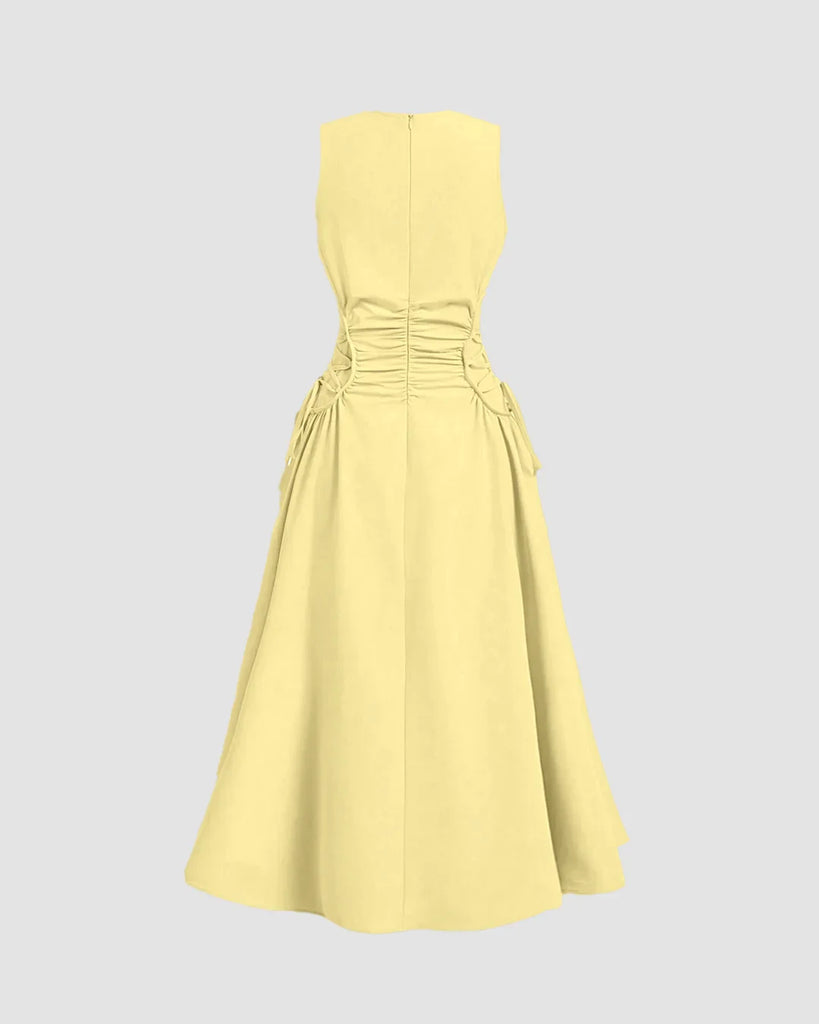 Vanilla sleeveless midi dress featuring side ruched detail, elegantly designed for a stylish look.
