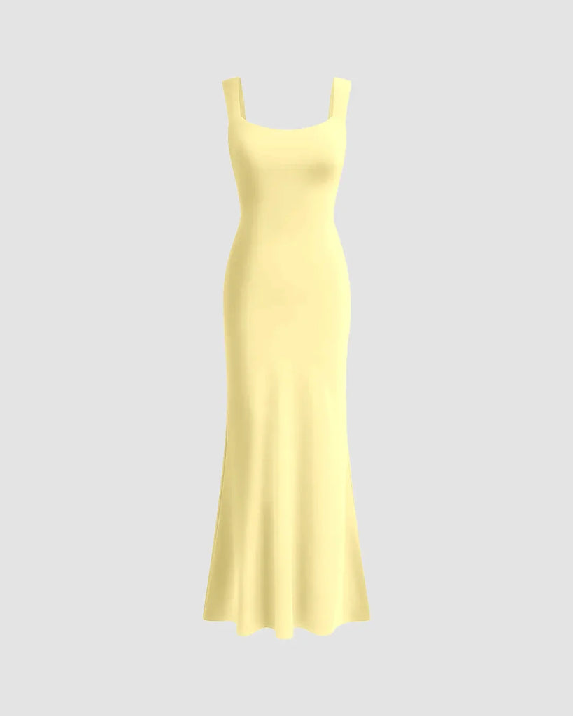 A vanilla bodycon midi dress with a square neckline, featuring a sleek, figure-hugging silhouette from top to hem.