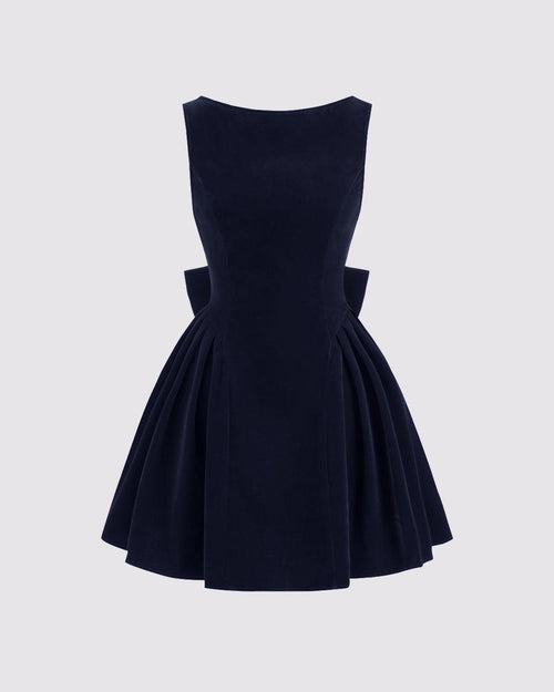 Front view of Navy sleeveless mini dress with structured bodice, flared skirt, and dramatic bow-accented open back, shown front and back.