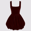 maroon mini dress with a scoop neckline, showcasing a stylish knotted bubble design