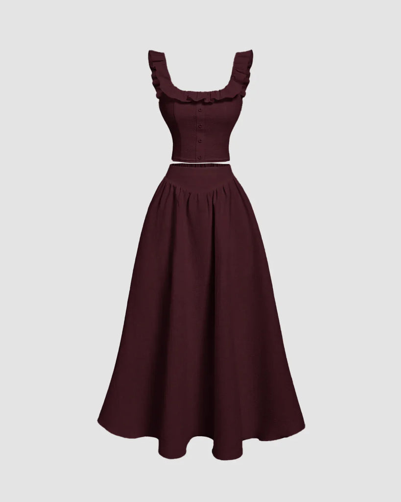 Vintage sleeveless maroon dress made of cotton, featuring a top and skirt set in a classic style.