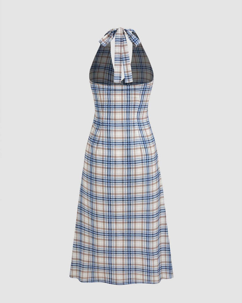 Back view of woven halter midi dress featuring a blue and white plaid pattern with a knotted detail at the waist