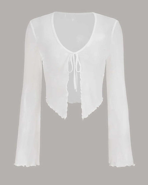 Front view of White top with ruffled sleeves, featuring a cropped design and tie front knot, made from shirred mesh fabric.