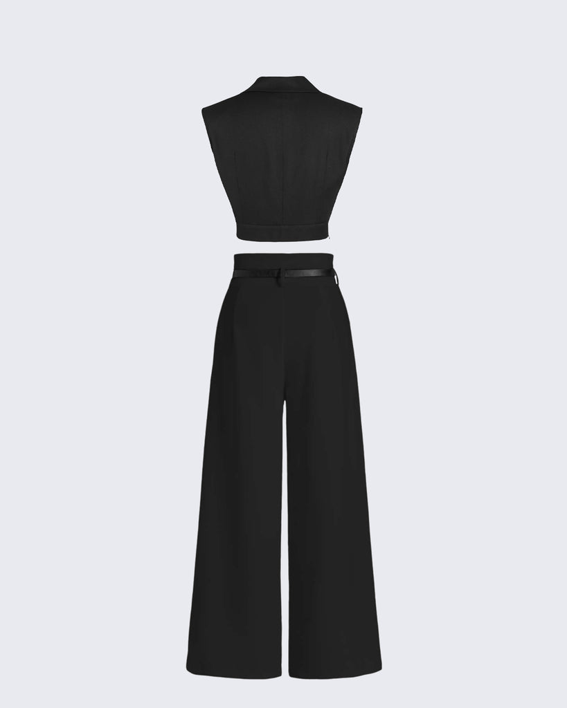 A back view of  black outfit with a sleeveless top and wide leg pants.