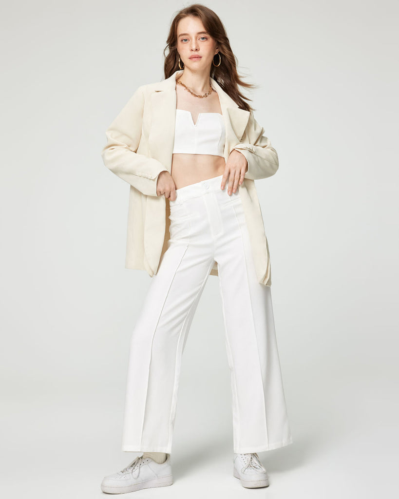 Model waerinf Aesthetics Top With Wide legged Trouser in White