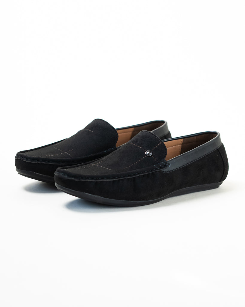 A  pair of black suede loafers 