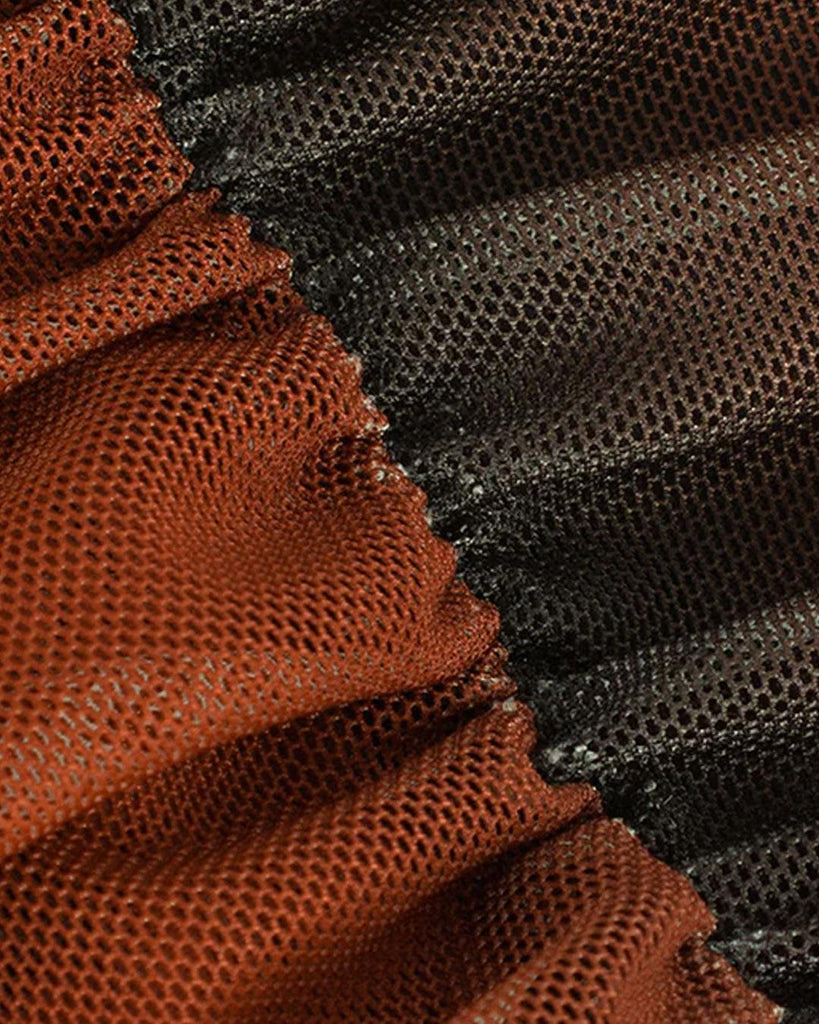 Tie-dye cropped top with long sleeves and a sheer mesh back, showcasing a stylish and modern design material view