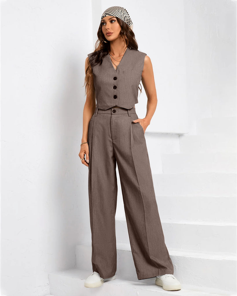A woman wearing formal waistcoat style vest and trouser in cappuccino