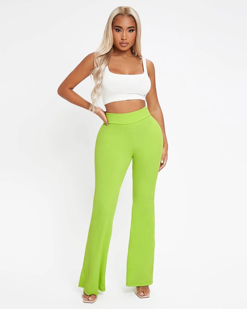 A model wearing white top and green trouser